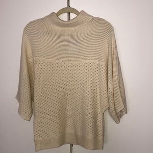 Funnel neck sweater in cream with batwing sleeves